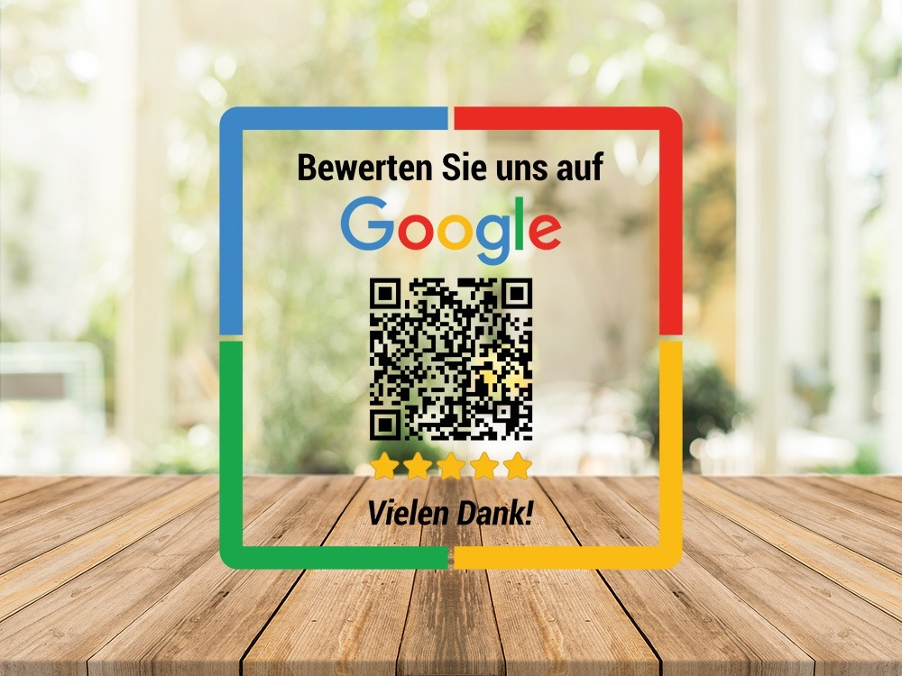 Ein transparenter Aufkleber mit QR Code zum Unternehmensprofil bei Google.